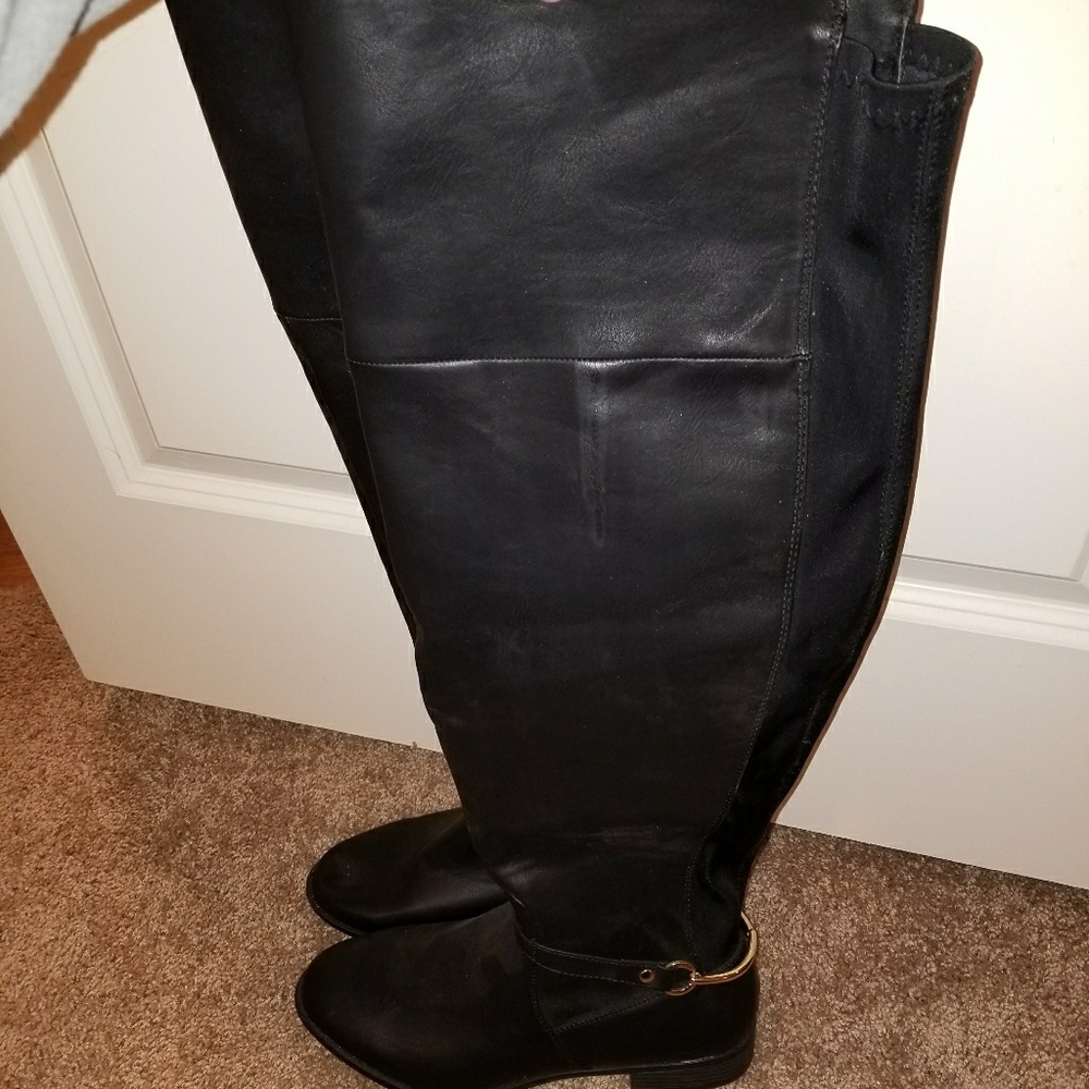 Over the knee flat boots